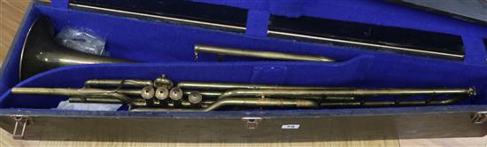 A French brass Couesnon slide trombone, cased